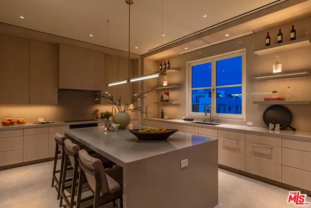a kitchen with counter space cabinets and appliances