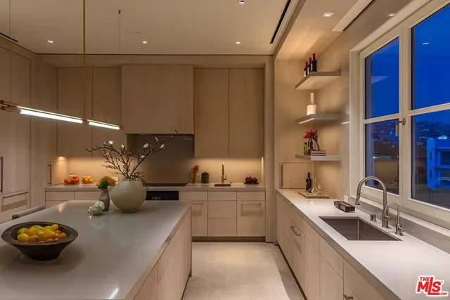 a view of a dining room and chandelier