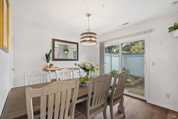 a vase of flowers sitting on a table