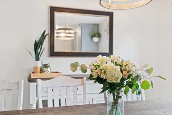 a kitchen with a sink appliances and cabinets