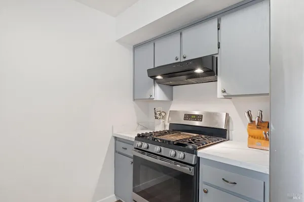 a spacious bedroom with a bed and a window