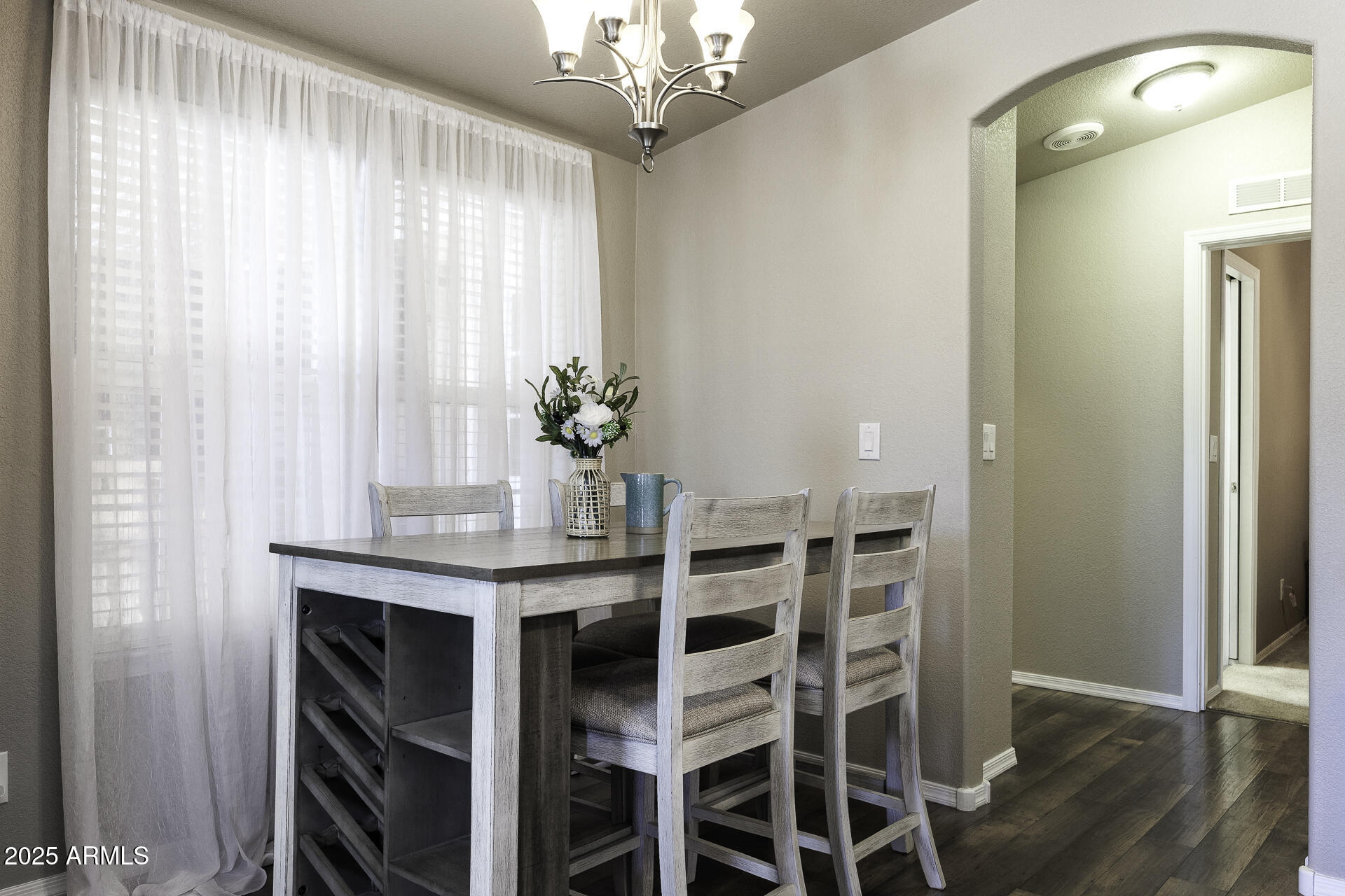 1110 North Henness Road, Unit 1351 Casa Grande, AZ 85122 - Photo 12 of 62 a dining room with furniture and window