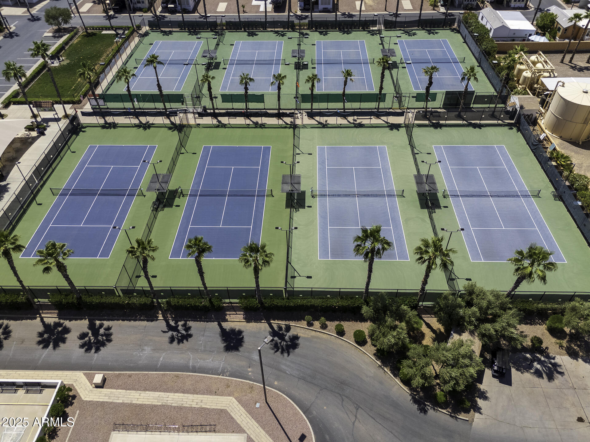 1110 North Henness Road, Unit 1351 Casa Grande, AZ 85122 - Photo 51 of 62 an aerial view of a building with garden space and car parked
