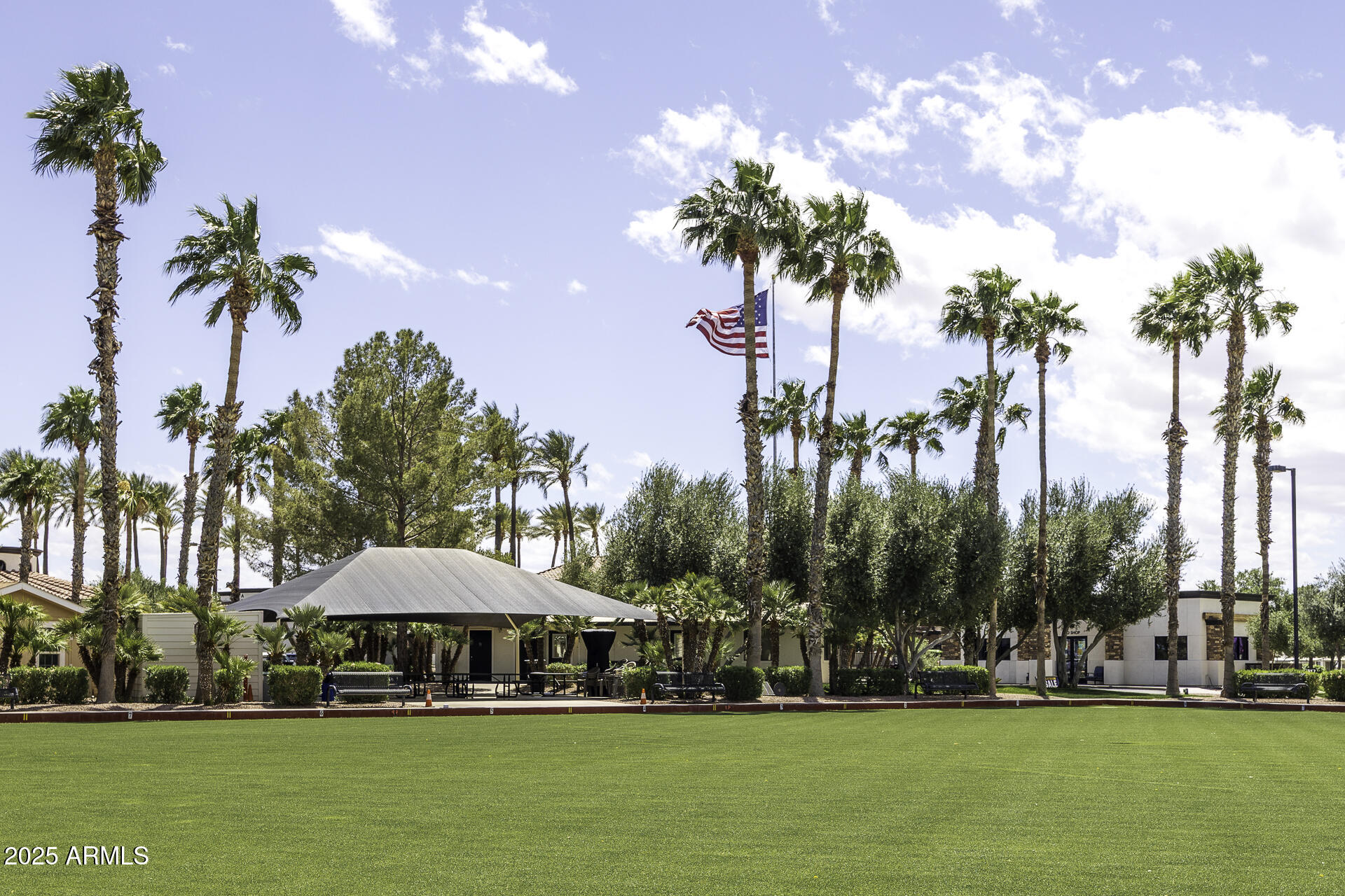 1110 North Henness Road, Unit 1351 Casa Grande, AZ 85122 - Photo 56 of 62 a view of a swimming pool with an outdoor space and seating area