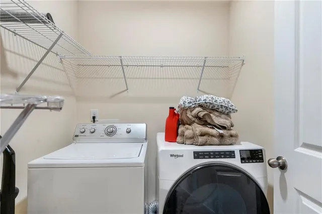 a utility room with dryer and washer