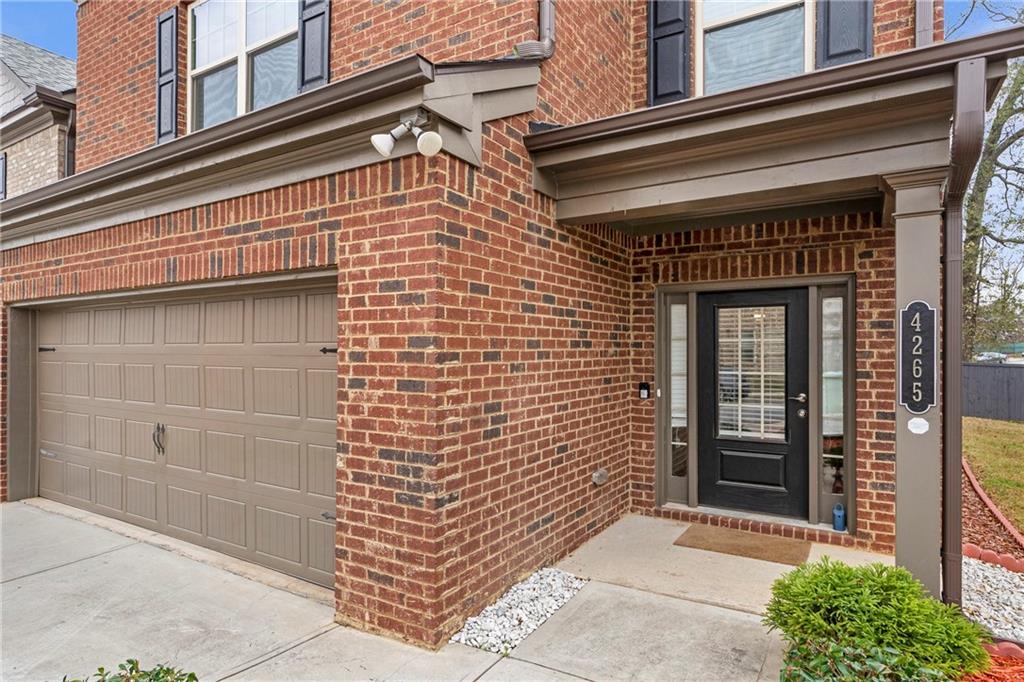 4265 Almanor Circle Norcross, GA 30071 - Photo 2 of 34 a building with a door