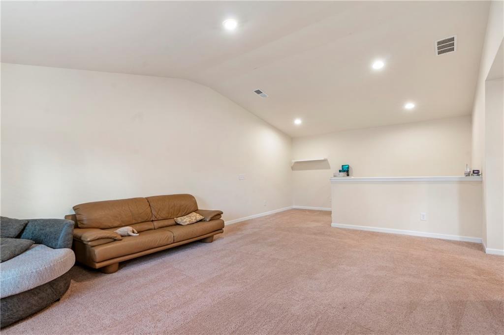 4265 Almanor Circle Norcross, GA 30071 - Photo 26 of 34 a living room with furniture