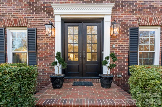 a view of a brick building with a bench