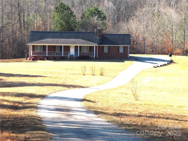 a view of a house with a swimming pool