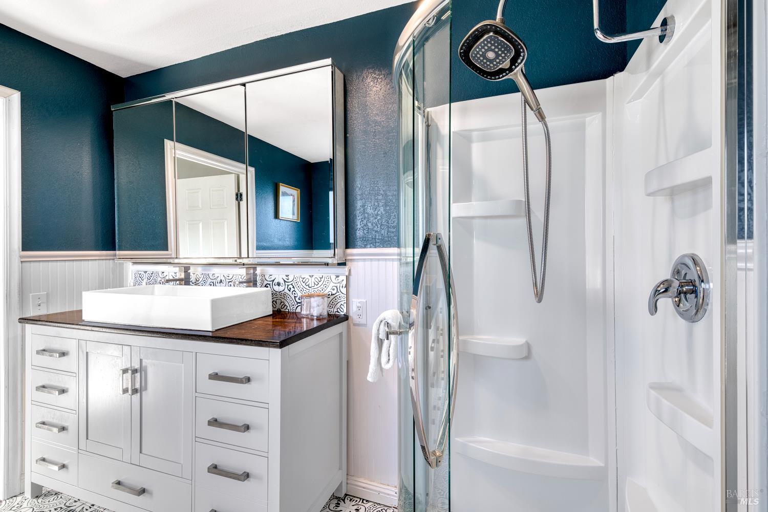 1534 Buchanan Street Novato, CA 94947 - Photo 24 of 30 a bathroom with a bathtub sink and mirror
