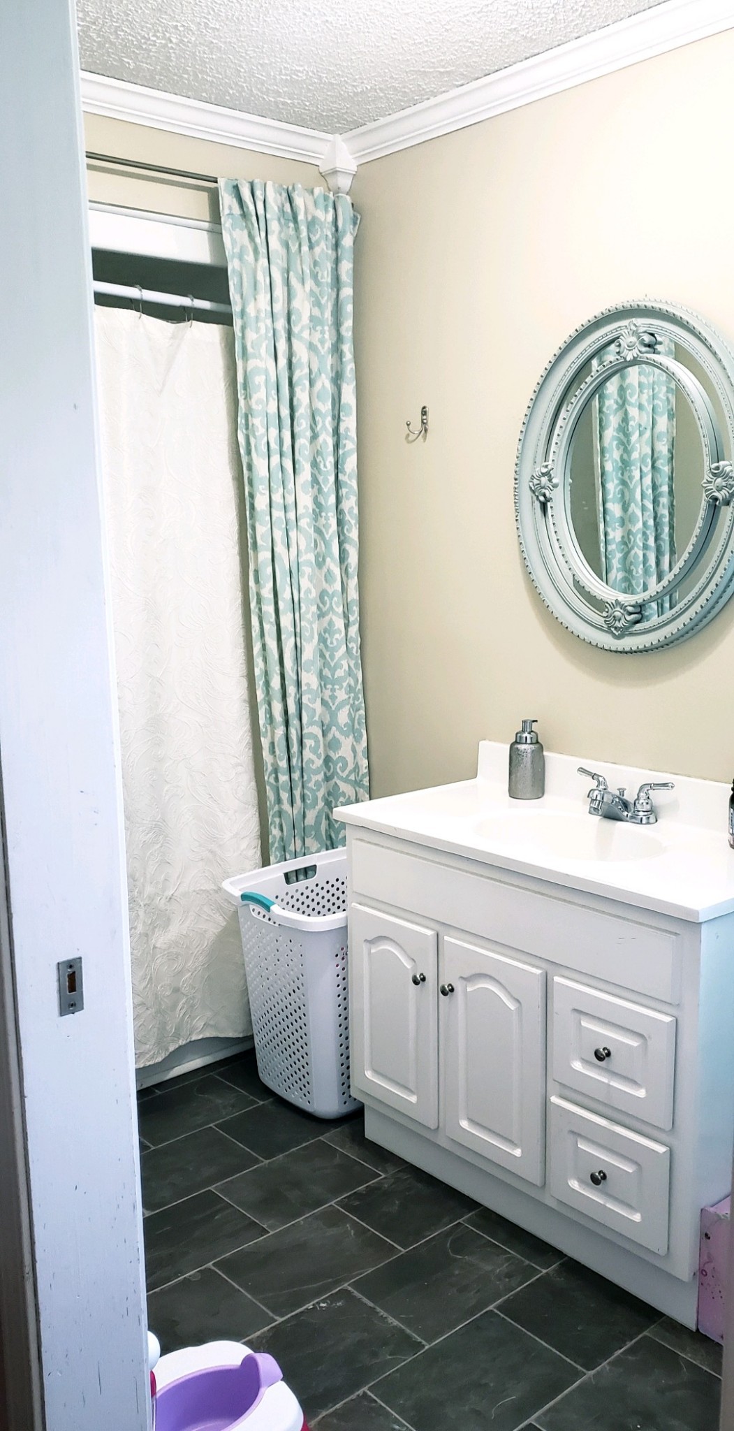 714 Days Road Lafayette, TN 37083 - Photo 16 of 19 a bathroom with a sink and a mirror