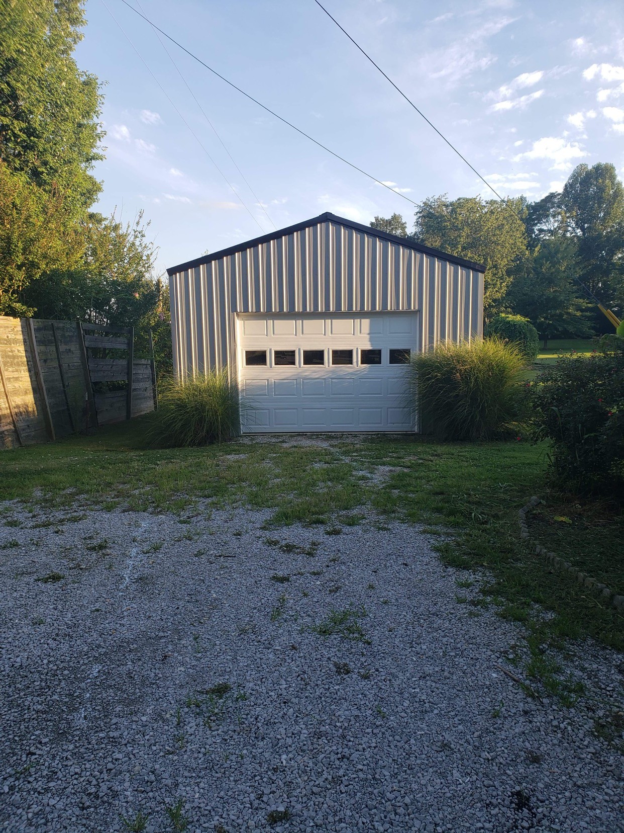 714 Days Road Lafayette, TN 37083 - Photo 5 of 19 a view of a house with a yard