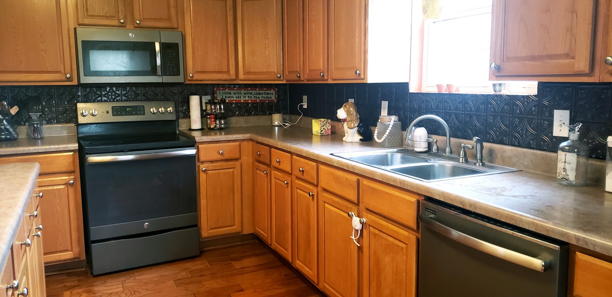 714 Days Road Lafayette, TN 37083 - Photo 8 of 19 a kitchen with stainless steel appliances granite countertop a sink stove and microwave