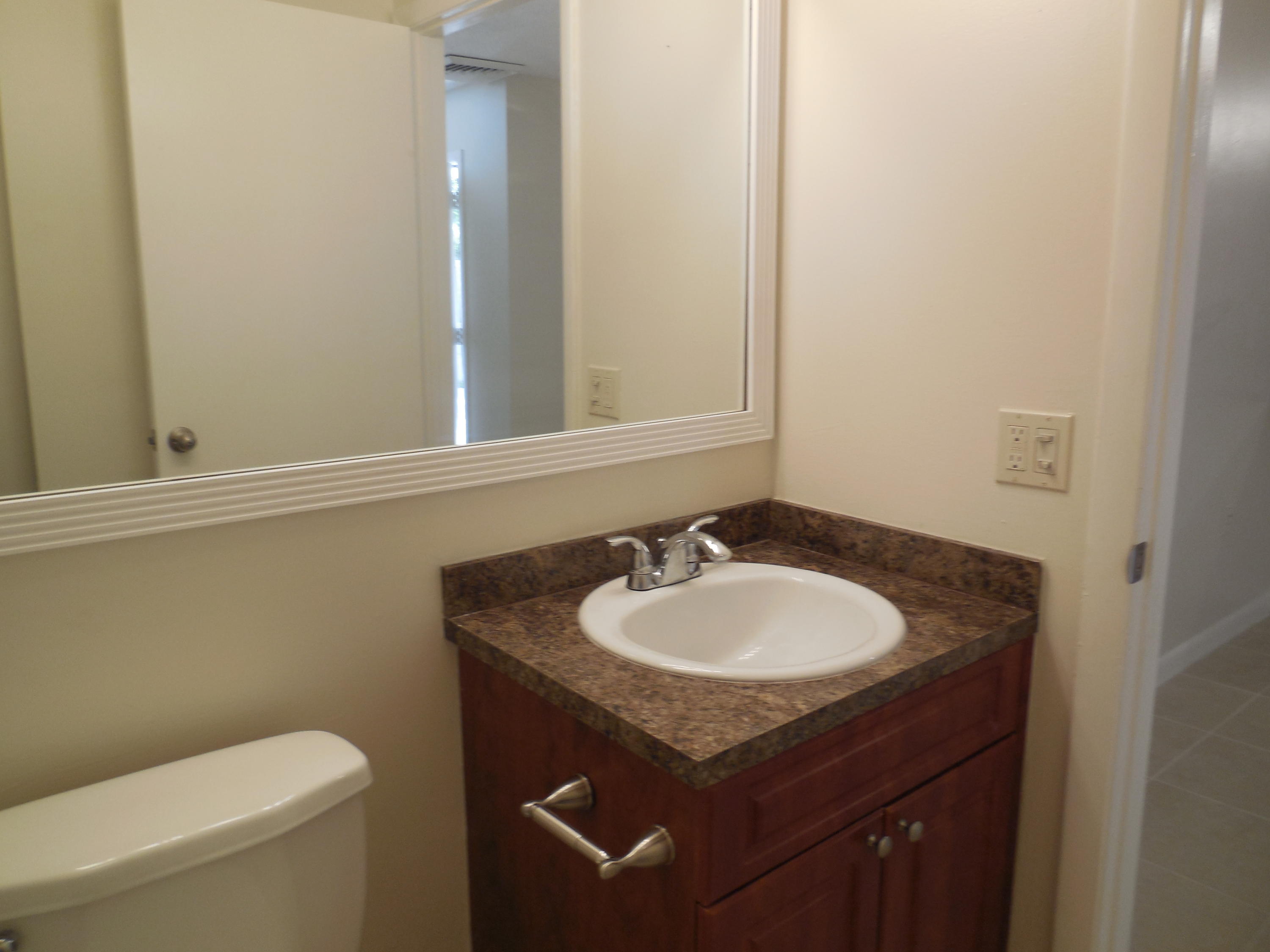 852 Blue Ridge Circle West Palm Beach, FL 33409 - Photo 16 of 19 powder room