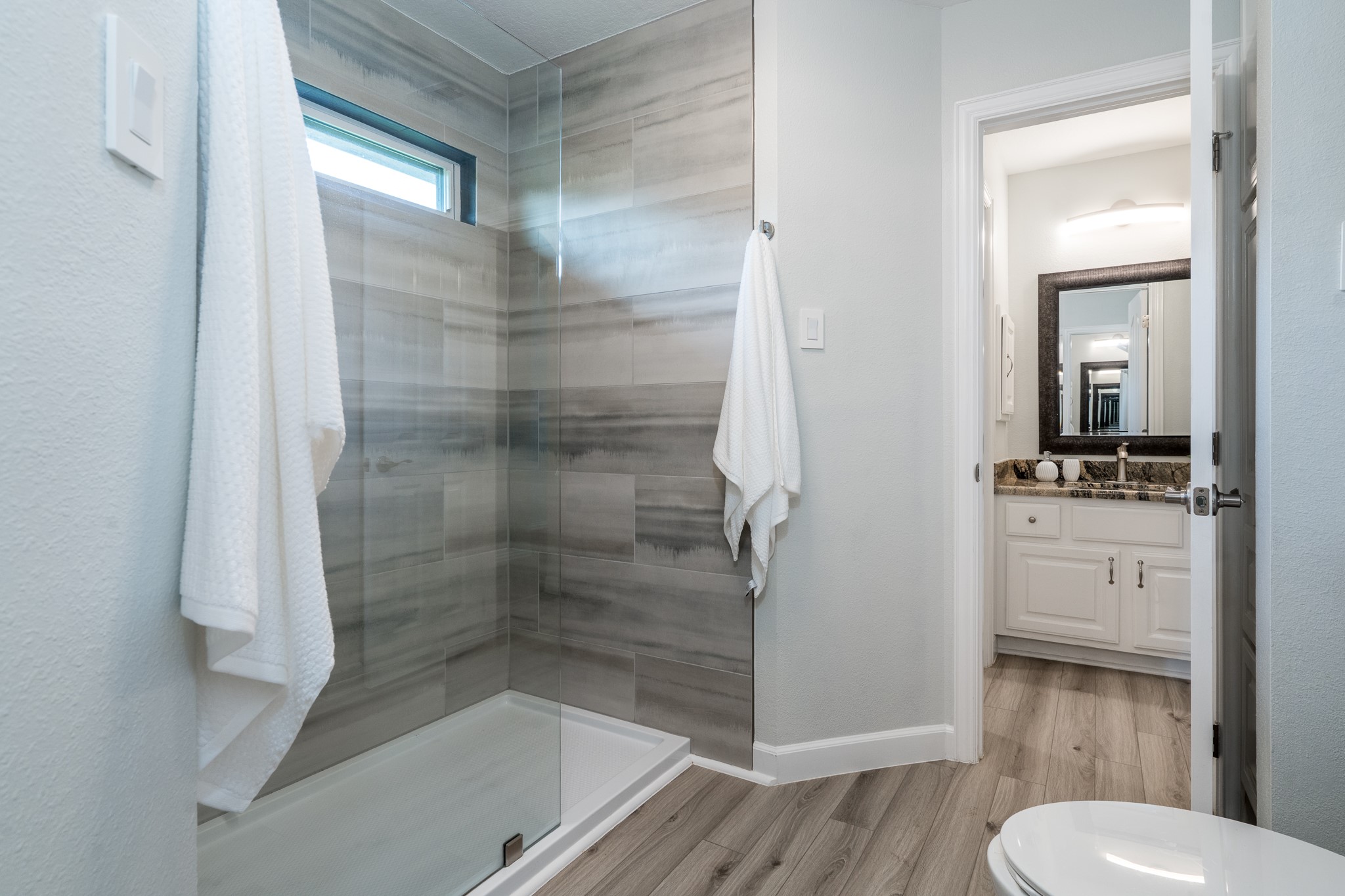 5914 Oakmoss Trail Spring, TX 77379 - Photo 23 of 50 This bathroom shares a wet space with two bedrooms, but each have their own vanity spaces, making morning rush hour a breeze!