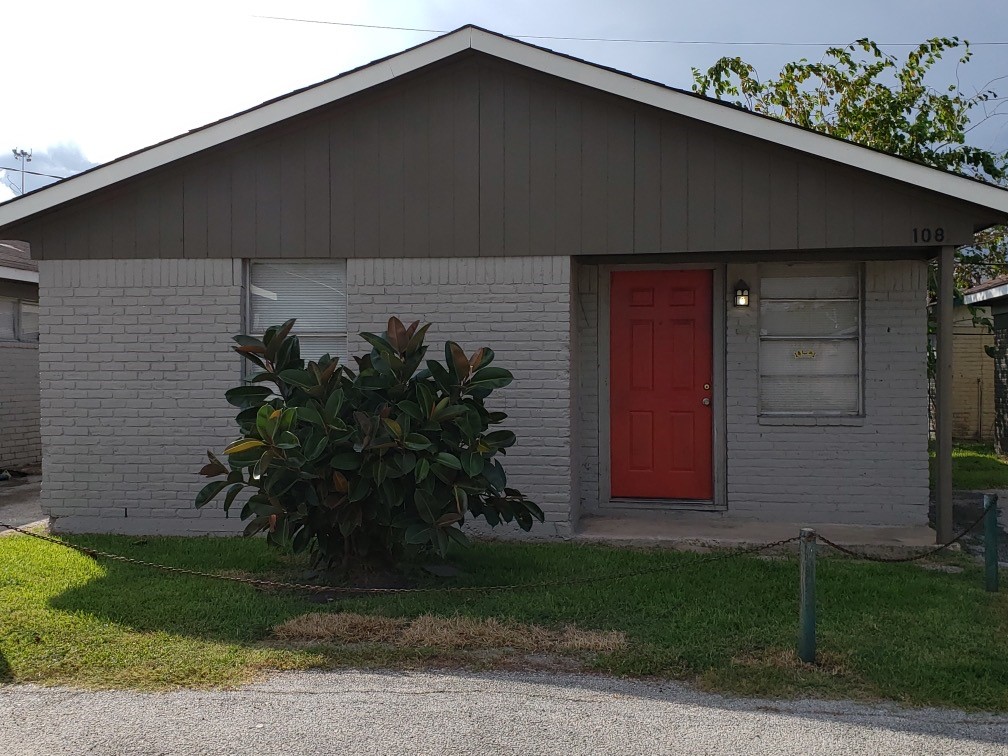 7812 Tierwester Street, Unit 120 Houston, TX 77021 - Photo 5 of 6 a couple of potted plants in front of door