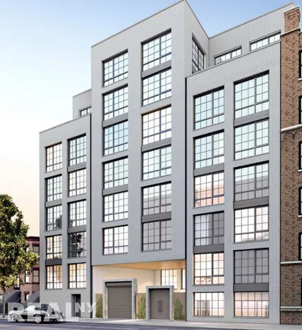 a view of a large building and a window