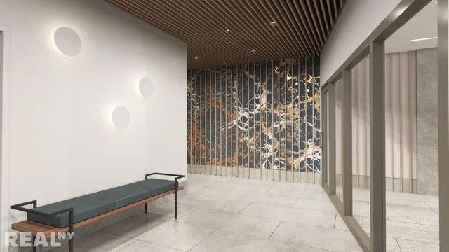 a view of a livingroom with couch and dining table chair