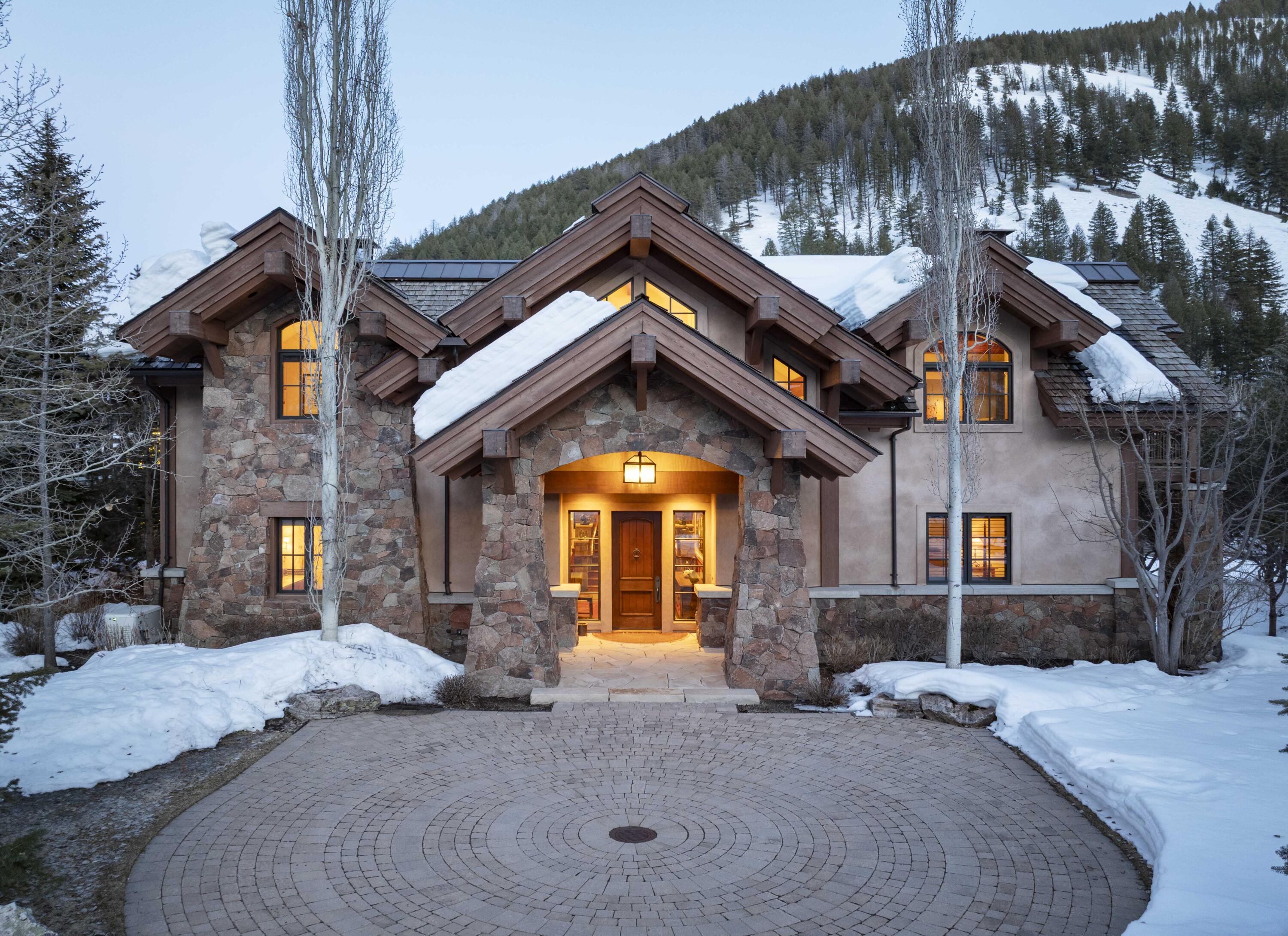 115 Ritchie Drive Ketchum, ID 83340 - Photo 34 of 48 winter evening front of home Ritchie