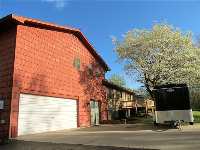 266 Bumpus Mills Road Dover, TN 37058 - Photo 4 of 20 View of back of home w/2-car garage.