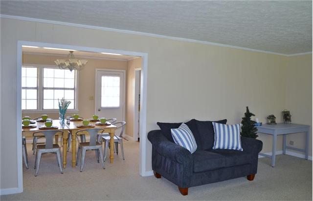 266 Bumpus Mills Road Dover, TN 37058 - Photo 8 of 20 Another view of living room into dining room.