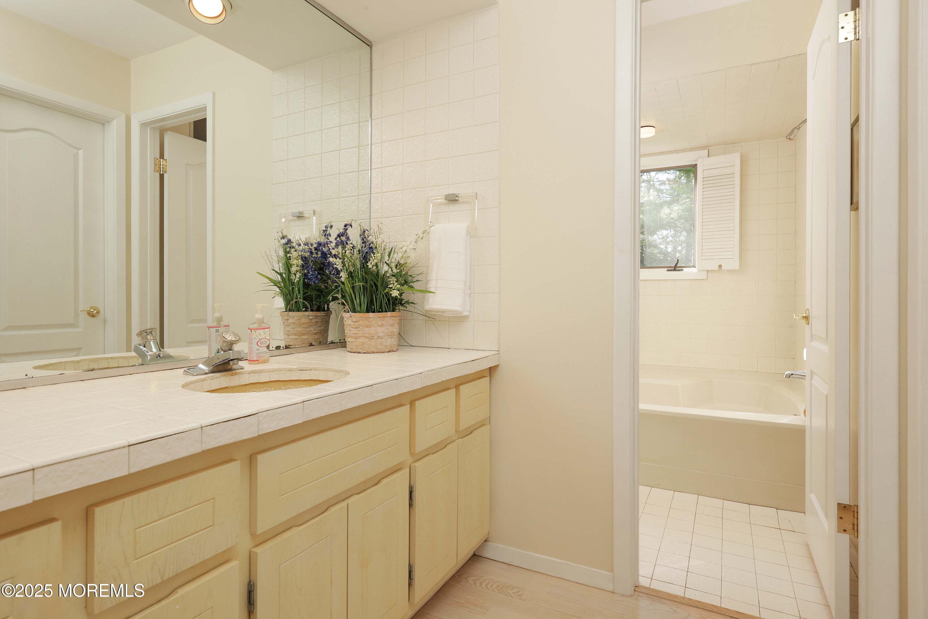 68 Middletown Road Holmdel, NJ 07733 - Photo 42 of 68 Main bath with tub/shower