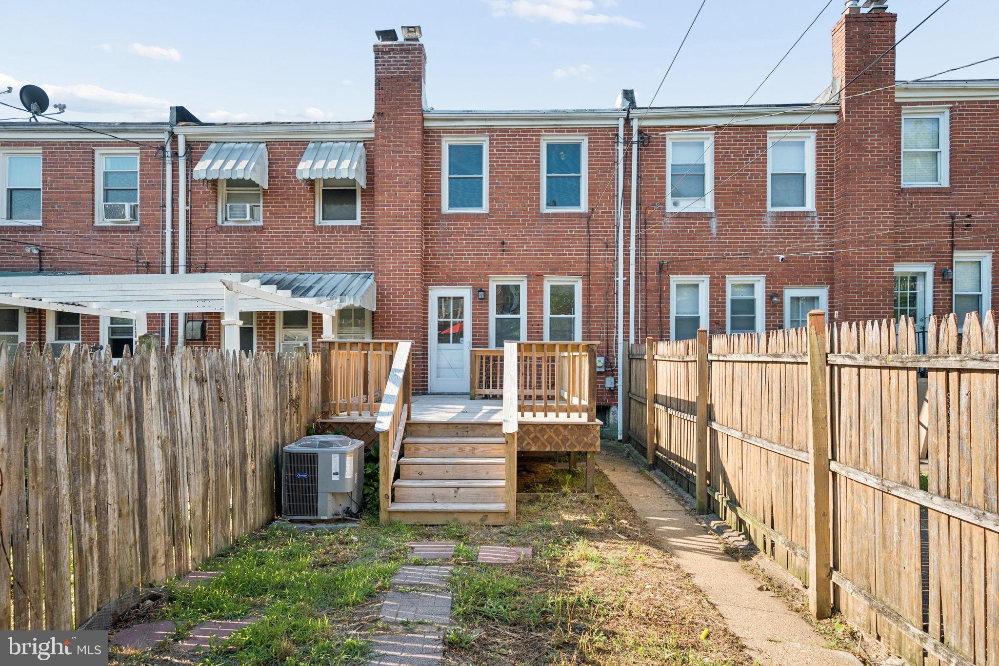 3548 Benzinger Road Baltimore, MD 21229 - Photo 34 of 40 a view of a house with wooden fence
