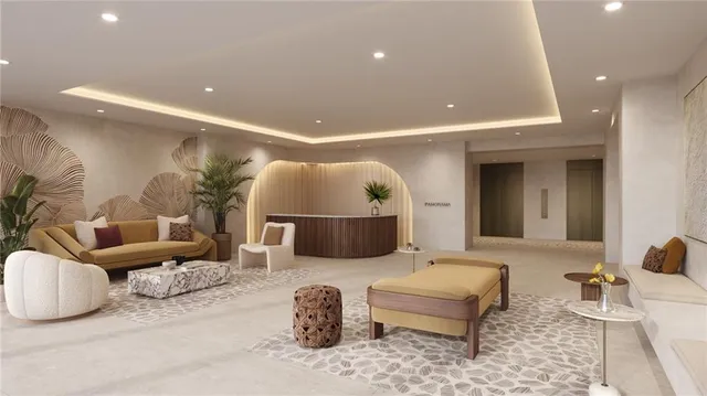 a living room with furniture and a large mirror