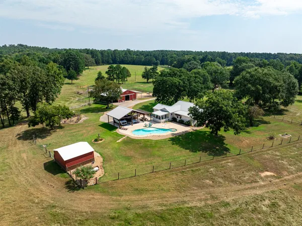 a view of a lake with a yard