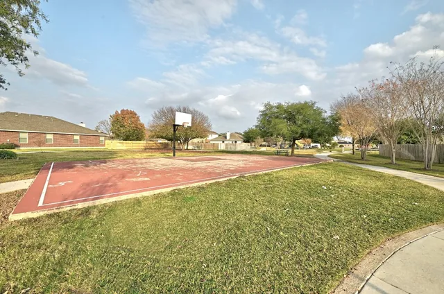 a view of a patio with a yard