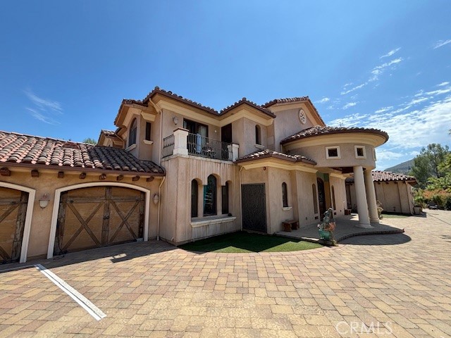 a front view of a house with yard