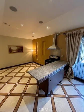 a room with a table and chairs