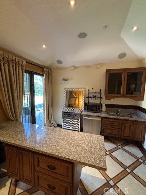 44 Hackamore Lane, Unit 46 Bell Canyon, CA 91307 - Photo 12 of 26 a kitchen with granite countertop lots of counter top space and stainless steel appliances