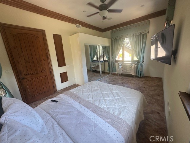 44 Hackamore Lane, Unit 46 Bell Canyon, CA 91307 - Photo 16 of 26 a bedroom with a bed and a mirror on the dresser