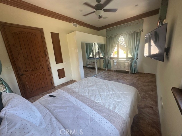 44 Hackamore Lane, Unit 46 Bell Canyon, CA 91307 - Photo 19 of 26 a bedroom with a bed and a mirror on the dresser