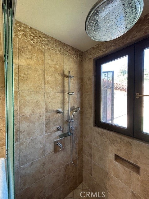 44 Hackamore Lane, Unit 46 Bell Canyon, CA 91307 - Photo 23 of 26 a bathroom with a shower and a sink
