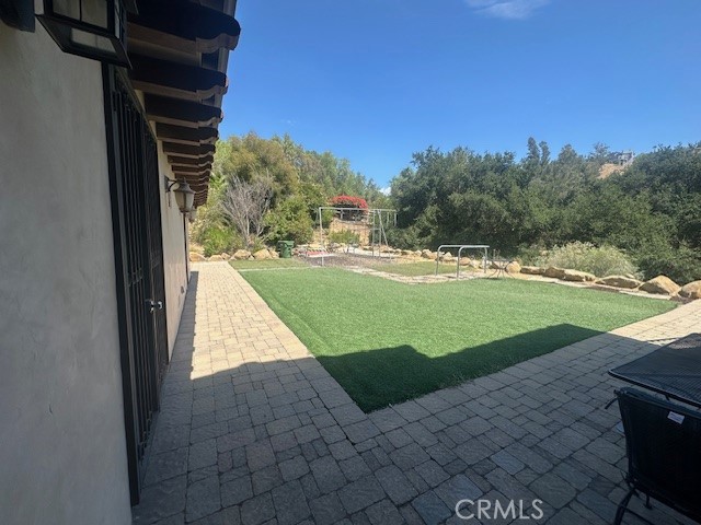 44 Hackamore Lane, Unit 46 Bell Canyon, CA 91307 - Photo 24 of 26 a view of a golf club with a backyard