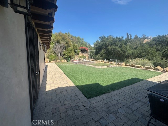 44 Hackamore Lane, Unit 46 Bell Canyon, CA 91307 - Photo 4 of 26 a view of a golf club with a backyard