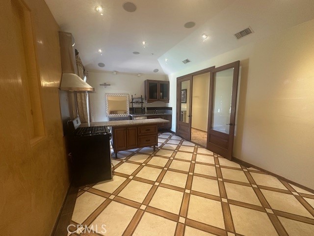 44 Hackamore Lane, Unit 46 Bell Canyon, CA 91307 - Photo 6 of 26 a living room with a couch and a flat screen tv