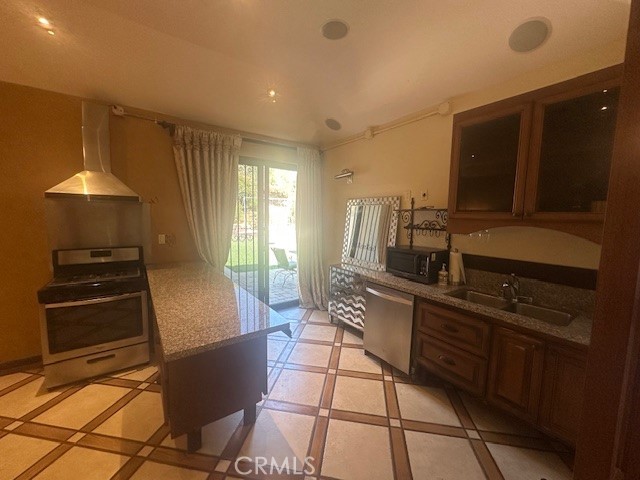 44 Hackamore Lane, Unit 46 Bell Canyon, CA 91307 - Photo 9 of 26 a kitchen with granite countertop lots of counter top space