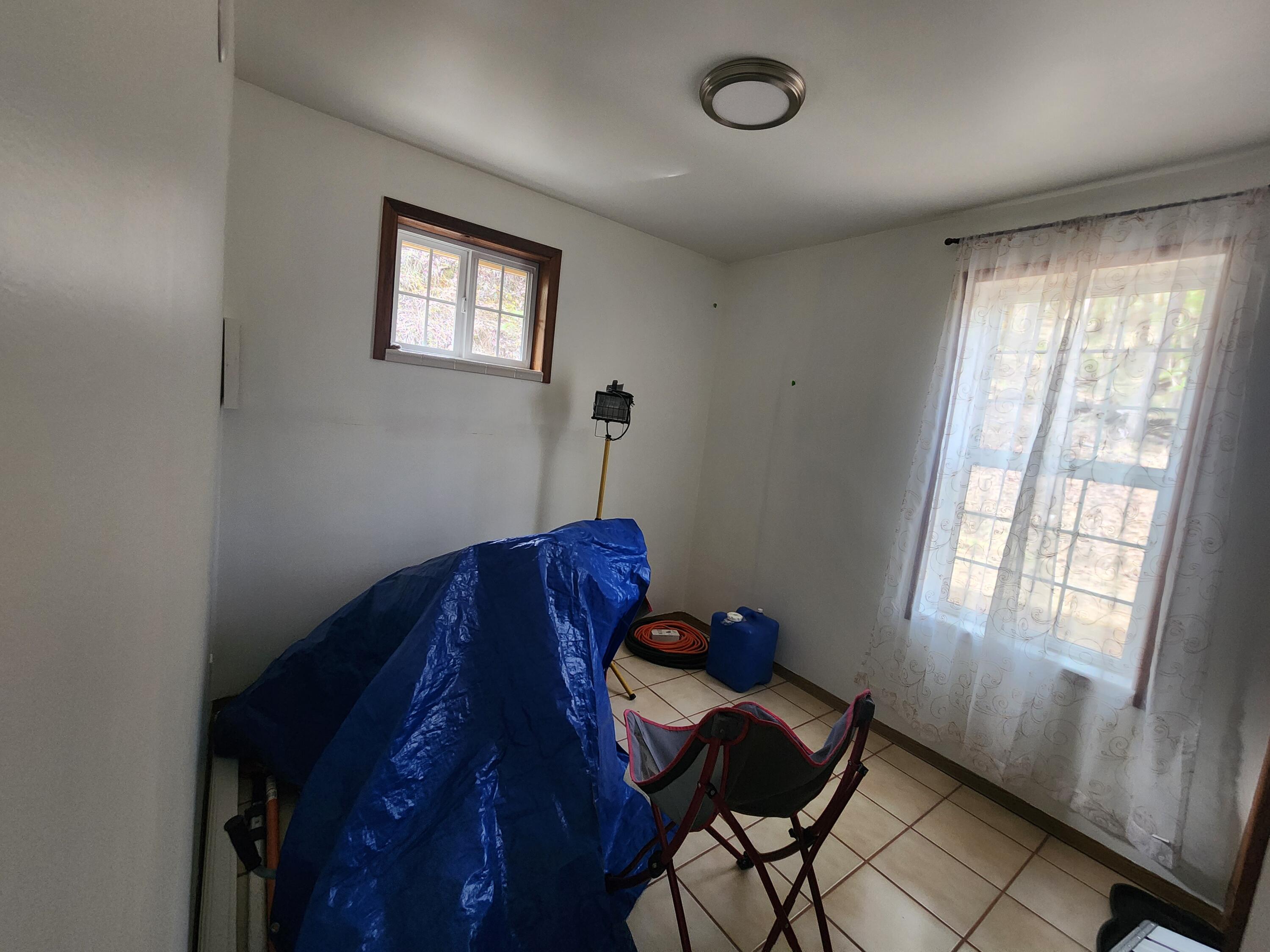 11238 East Evans Creek Road Rogue River, OR 97537 - Photo 10 of 29 a room with furniture and windows