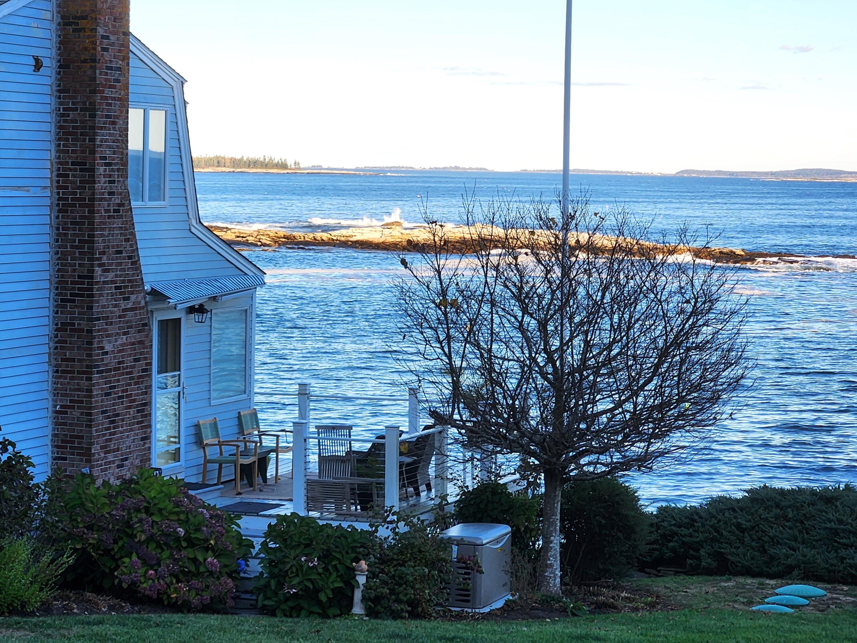 317 Highway 32 Chamberlain, ME 04541 - Photo 4 of 51 Back view w deck