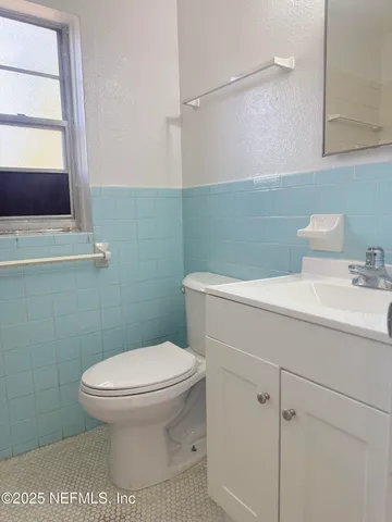 an empty room with wooden door