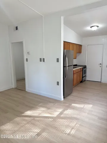 a view of a livingroom with a stove