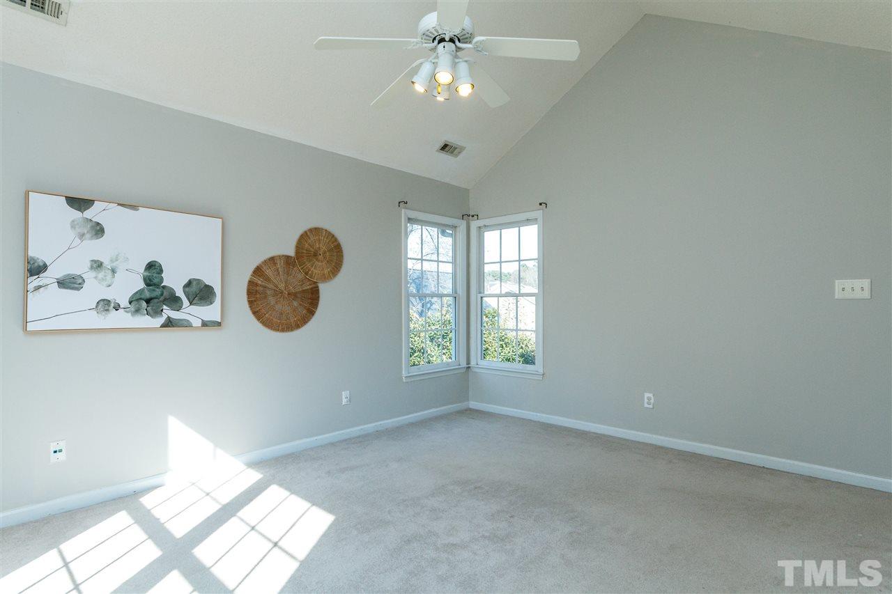 11205 North Radner Way Raleigh, NC 27613 - Photo 13 of 22 a view of an empty room with a window