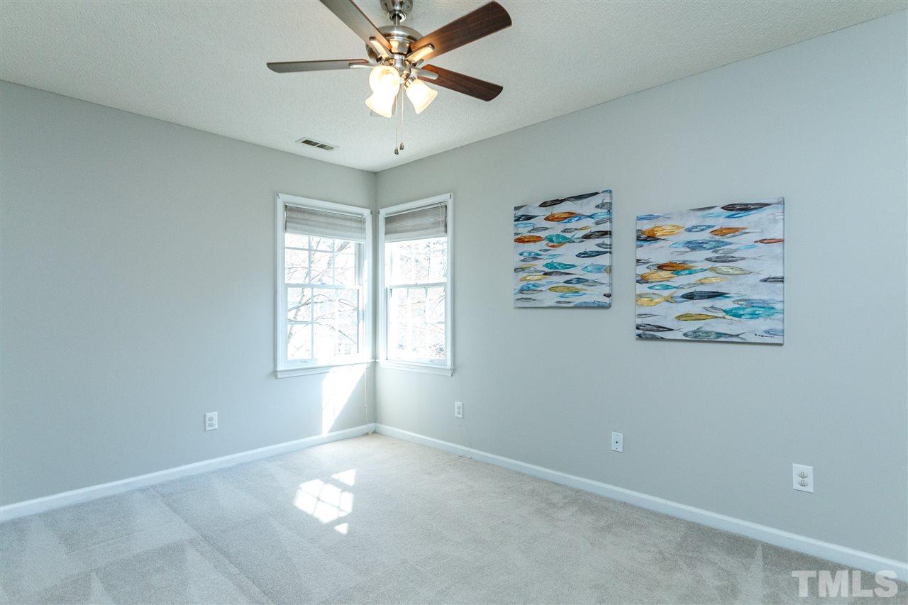 11205 North Radner Way Raleigh, NC 27613 - Photo 17 of 22 a view of an empty room with a window