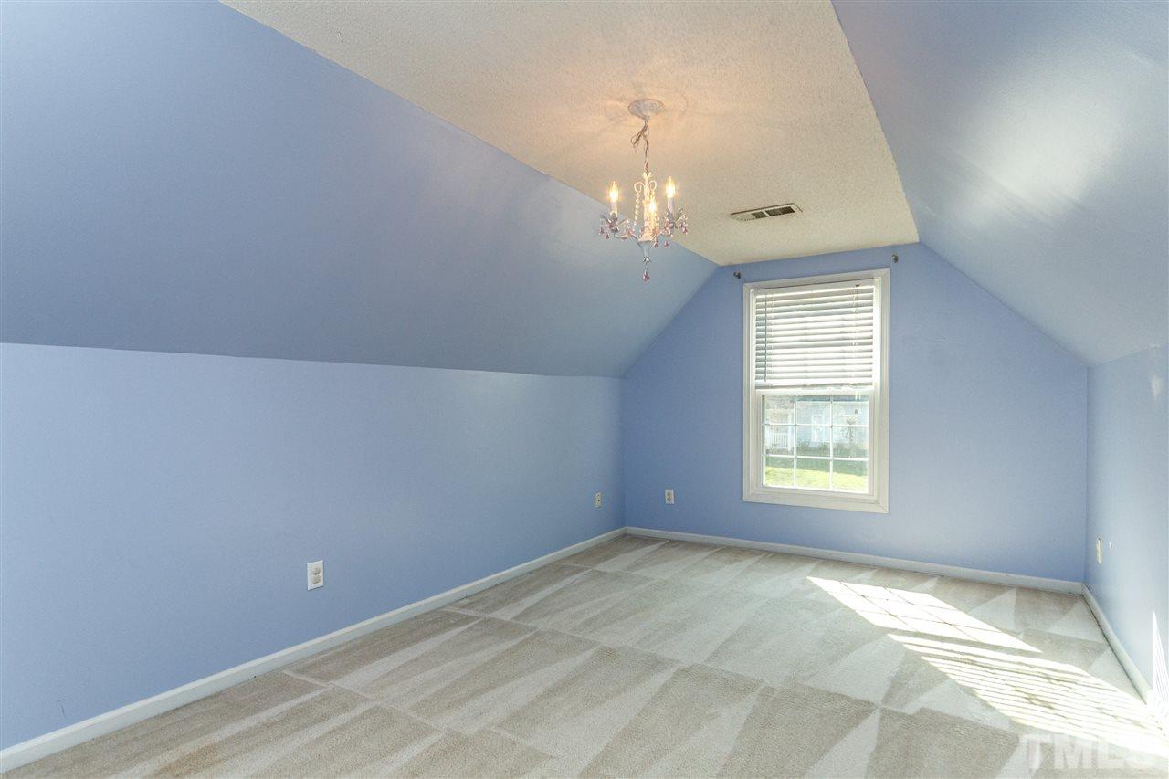 11205 North Radner Way Raleigh, NC 27613 - Photo 20 of 22 an empty room with a window
