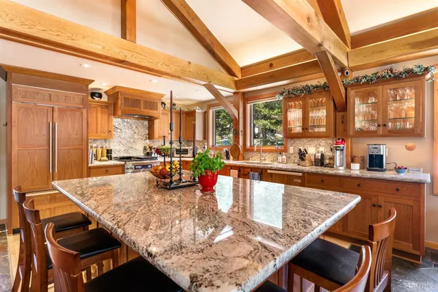a kitchen with granite countertop lots of counter top space