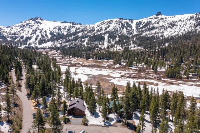 a view of a large building with a mountain view