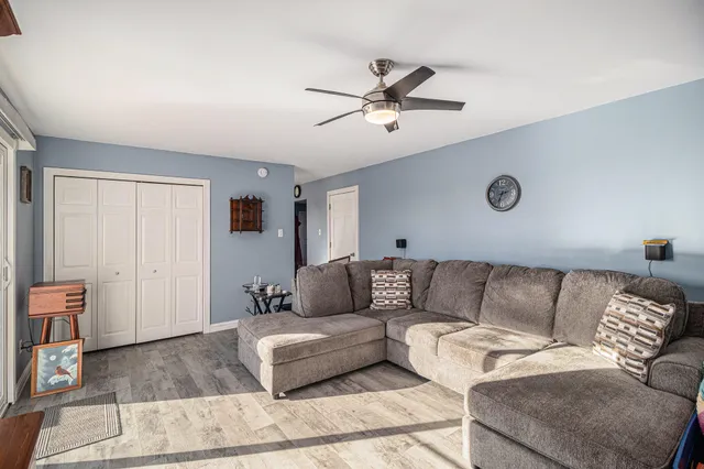 a living room with furniture and a couch